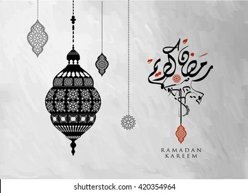  Ramadan Kareem beautiful greeting card with arabic calligraphy which means ''Ramadan kareem '' - islamic background with mosques suitable also for Eid Mubarak .