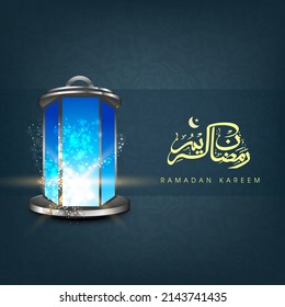 Ramadan Kareem Calligraphy In Arabic Language With Shiny 3d Lantern On Dark Teal Floral Pattern Background.