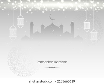 Ramadan Kareem Concept With Arabic Lanterns hang And Bokeh Effect On Gray Silhouette Mosque Background.