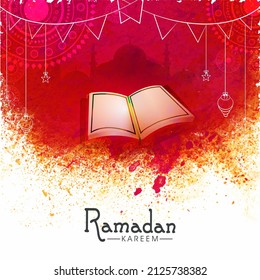 Ramadan Kareem Concept With Open Holy Book Quran, Silhouette Mosque On Abstract Background.