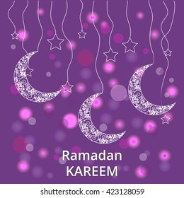 Ramadan Kareem greeting background.Colorful Arabic Greeting card with decorated crescent moon for holy month of Muslim community.islamic backdrop.Beautiful shiny backdrop.Soft purple colors