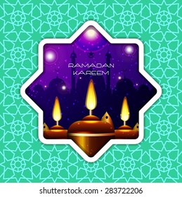 Ramadan Kareem greeting card / Vector template greeting card with intricate oil lamp on shiny abstract background
