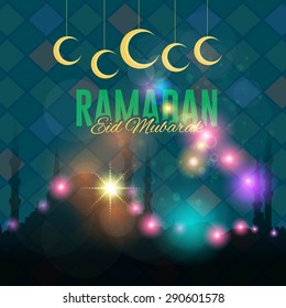 Ramadan Kareem - Islamic Holy Nights Theme and hanging Crescent Moon Symbols - Arabic "Eid Mubarak", "be Blessed" at English