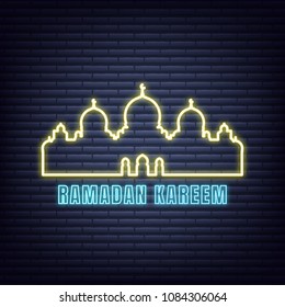 Ramadan Kareem neon design. Illuminated typography signboard for Ramadan