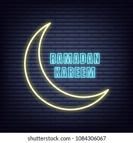 Ramadan Kareem neon design. Illuminated typography signboard for Ramadan