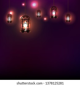 Ramadan lanterns with candles on dark background