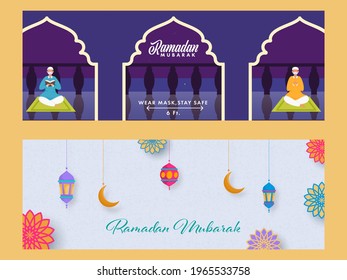 Ramadan Mubarak Header Or Banner Set With Crescent Moon, Lanterns Hang And Muslim Men Wear Safety Mask In Praying Pose On Blue Background.