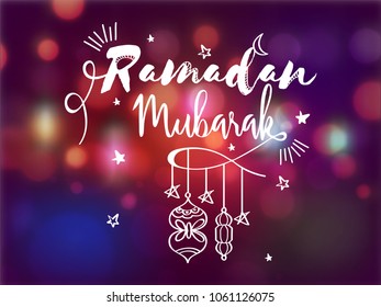 Ramadan Mubrark text with hanging lanterns, and stars on shiny colorful background. 