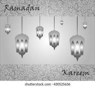 Ramadan  pattern silver with shining lanterns and text on the gray background.