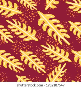 Random abstract botanic seamless pattern with light yellow leaf branches print. Dark pink background with splashes. Designed for fabric design, textile print, wrapping, cover. Vector illustration.