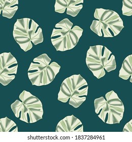 Random botanic seamless patttern with green monstera ornament. Hawaiian palm foliage print with dark tuquoise background. Great for fabric design, textile print, wrapping, cover. Vector illustration.