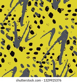 Random camouflage pattern with irregular watercolor brush strokes.  Yellow vector seamless camouflage pattern. Hand drawn chevron lines, spots. Rhythmic brush paint repeat. Watercolor organic shapes