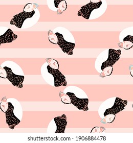 Random childish style seamless pattern with black and white colored puffrin ornament. Pink striped background. Vector illustration for seasonal textile prints, fabric, backdrops and wallpapers.