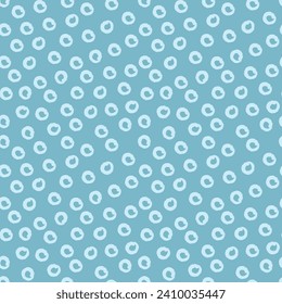 Random circle spots, abstract minimalistic background. Seamless vector pattern with rounded stains. Monochrome simple blue vector illustration.