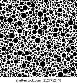 Random dots seamless pattern. Vector texture with black circles