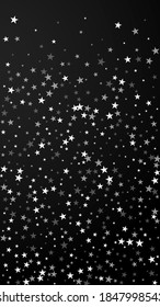 Random falling stars Christmas background. Subtle flying snow flakes and stars on black background. Amusing winter silver snowflake overlay template. Favorable vertical illustration.