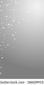 Random falling stars Christmas background. Subtle flying snow flakes and stars on grey background. Alive winter silver snowflake overlay template. Memorable vertical illustration.