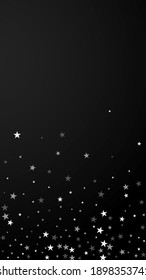 Random falling stars Christmas background. Subtle flying snow flakes and stars on black background. Appealing winter silver snowflake overlay template. Noteworthy vertical illustration.