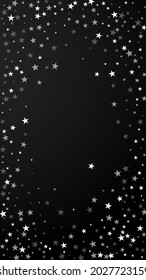 Random falling stars Christmas background. Subtle flying snow flakes and stars on black background. Actual winter silver snowflake overlay template. Exotic vertical illustration.