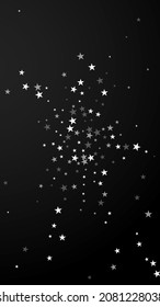 Random falling stars Christmas background. Subtle flying snow flakes and stars on black background. Alive winter silver snowflake overlay template. Fancy vertical illustration.