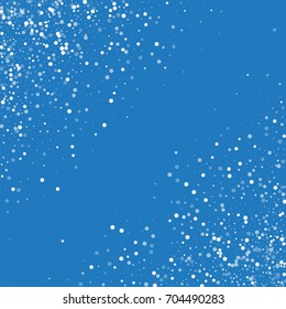 Random falling white dots. Abstract chaotic scatter on blue background. Vector illustration.