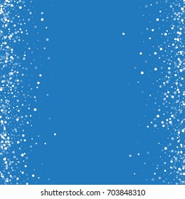 Random falling white dots. Messy border on blue background. Vector illustration.