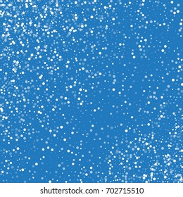 Random falling white dots. Scatter pattern on blue background. Vector illustration.