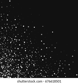 Random falling white dots. Scattered bottom left corner on black background. Vector illustration.