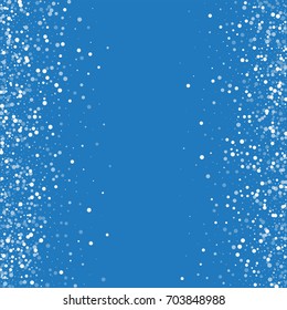 Random falling white dots. Scattered frame on blue background. Vector illustration.