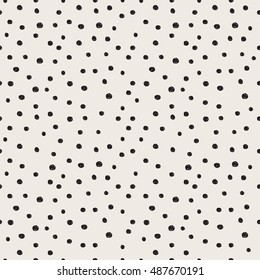 Random hand drawn dot pattern. Seamless texture