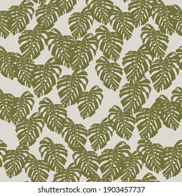 Random little monstera green pale silhouettes seamless pattern. Grey background. Decorative backdrop for wallpaper, textile, wrapping paper, fabric print. Vector illustration.