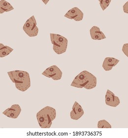 Random pale seamless pattern with beige colored skull abstract print. Pastel background. Stock illustration. Vector design for textile, fabric, giftwrap, wallpapers.