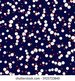 Random placed vector dots in maritime colors as seamless repeat pattern with dark blue background.