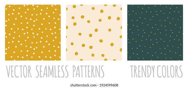 Random Polka dot seamless patterns. Set of vector backgrounds. Trendy colors green, golden, pastel beige. Card templates.