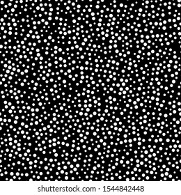 Random scattered polka dot pattern, abstract black and white background, white dots on black. Seamless vector pattern. Black and white polka dot pattern. Celebration confetti background.