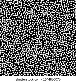 Random scattered polka dot pattern, abstract black and white background, white dots on black. Seamless vector pattern. Black and white polka dot pattern. Celebration confetti background.