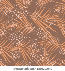 Random seamless autumn pattern with fern leaf silhouettes. Orange creative botanic sihouettes on brown background with splashes. For fabric design, textile print, wrapping, cover. Vector illustration