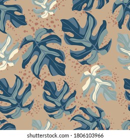 Random seamless doodle pattern with navy blue monstera silhouettes. Beige background with splashes. Decorative backdrop for wallpaper, textile, wrapping paper, fabric print. Vector illustration.
