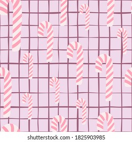 Random seamless pattern with doodle christmas candy ornament. Lollipop silouettes in pink colors on pastel chequered background. For fabric design, textile print, wrapping, cover. Vector illustration