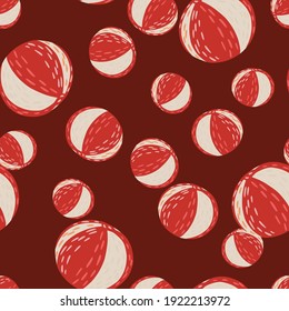 Random seamless pattern with doodle hand drawn beach balls ornament. Maroon background. Decor print. Flat vector print for textile, fabric, giftwrap, wallpapers. Endless illustration.
