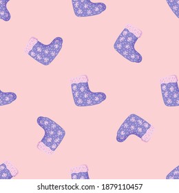 Random seamless pattern with hand drawn wool blue winter shoes ornament. Pink background. Stock illustration. Vector design for textile, fabric, giftwrap, wallpapers.