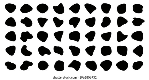 Formas aleatorias. Resumen de manchas negras, gotas de tinta y siluetas de guijarros. Colección de puntos redondeados de forma irregular.
