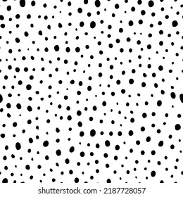 Random small specks vector seamless pattern. Trendy grunge design with dots, rough small circles. Black uneven specks, spots, blobs, splashes. Hand drawn dotted texture. Black ink splatter