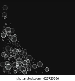 Random soap bubbles. Bottom left corner with random soap bubbles on black background. Vector illustration.