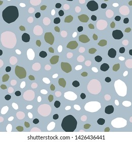 Random stones wallpaper. Pebble seamless pattern. Abstract geometric dotted texture. Vector illustration