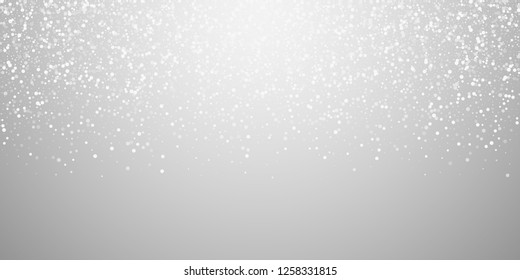 Random white dots Christmas background. Subtle flying snow flakes and stars on light grey background. Beauteous winter silver snowflake overlay template. Pleasant vector illustration.