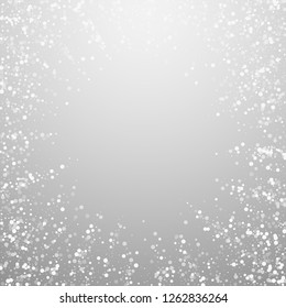 Random white dots Christmas background. Subtle flying snow flakes and stars on light grey background. Amazing winter silver snowflake overlay template. Unequaled vector illustration.