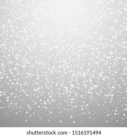 Random white dots Christmas background. Subtle flying snow flakes and stars on light grey background. Alluring winter silver snowflake overlay template. Artistic vector illustration.