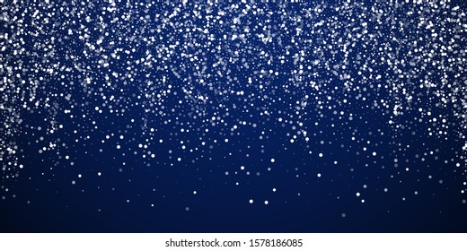 Random white dots Christmas background. Subtle flying snow flakes and stars on dark blue night background. Attractive winter silver snowflake overlay template. Creative vector illustration.