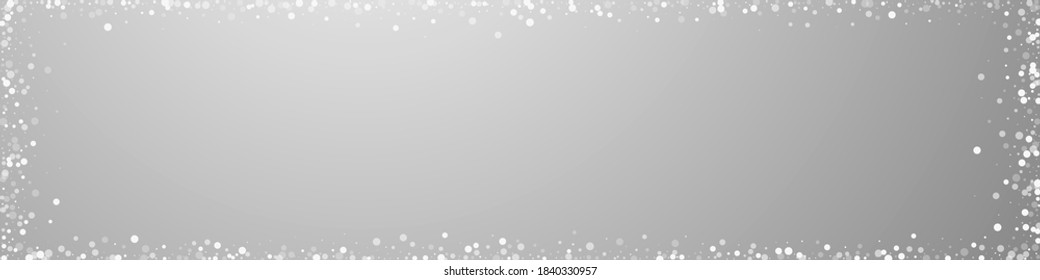 Random white dots Christmas background. Subtle flying snow flakes and stars on grey background. Brilliant winter silver snowflake overlay template. Creative panoramic illustration.